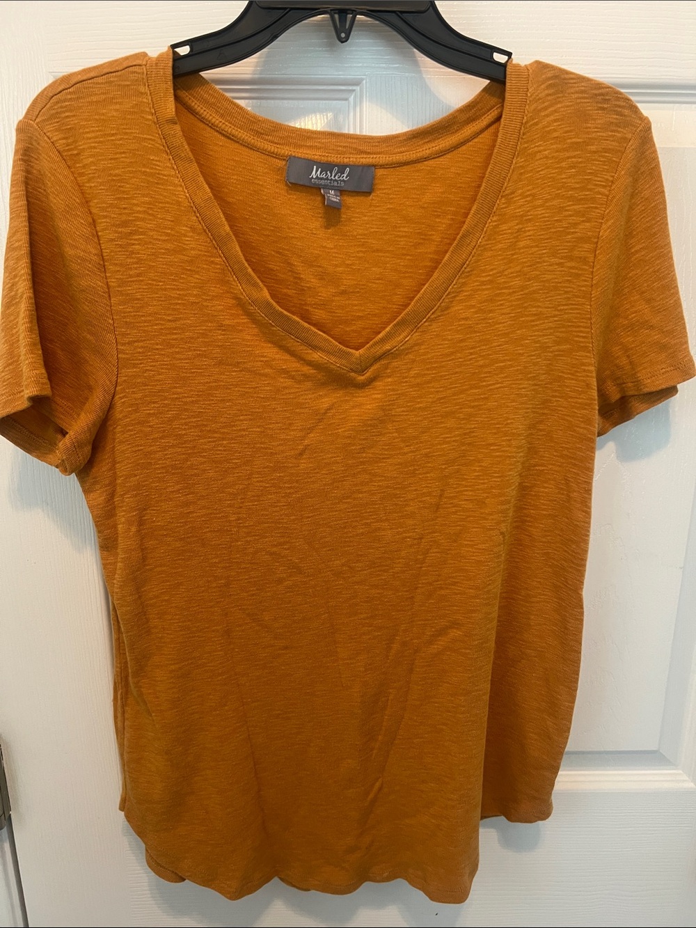 Marled Women's V-Neck Short Sleeve Tee in Mustard Yellow. Size medium